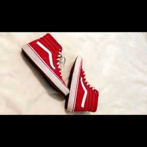 Red and white high top Vans